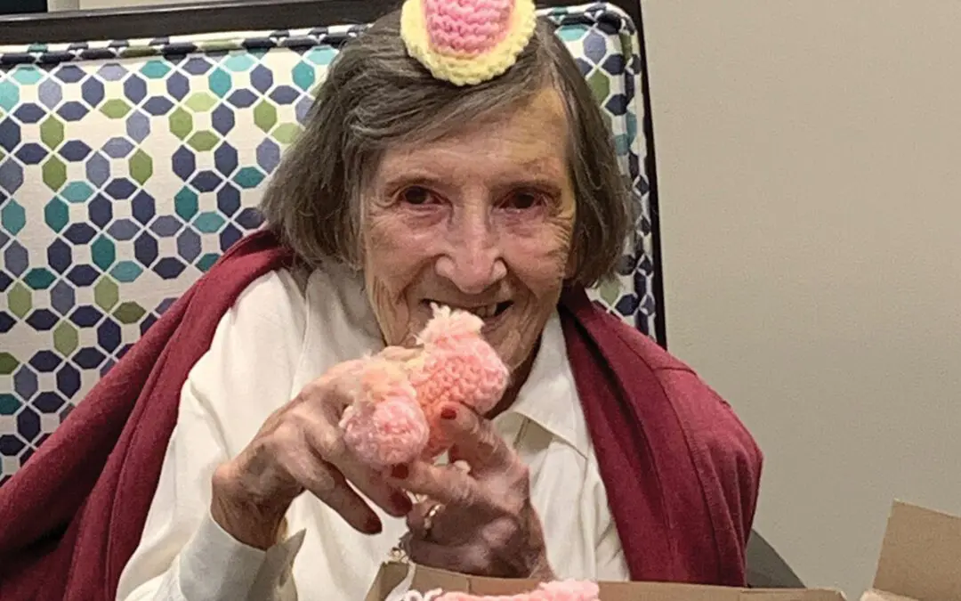 WhiteStone Resident Donates Hundreds of Baby Booties and Hats to Cone Health Children