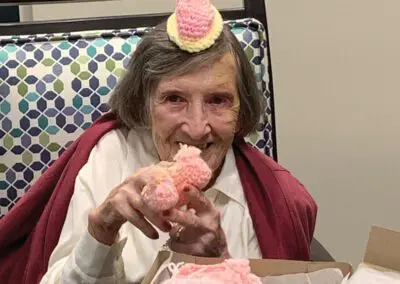 WhiteStone Resident Donates Hundreds of Baby Booties and Hats to Cone Health Children