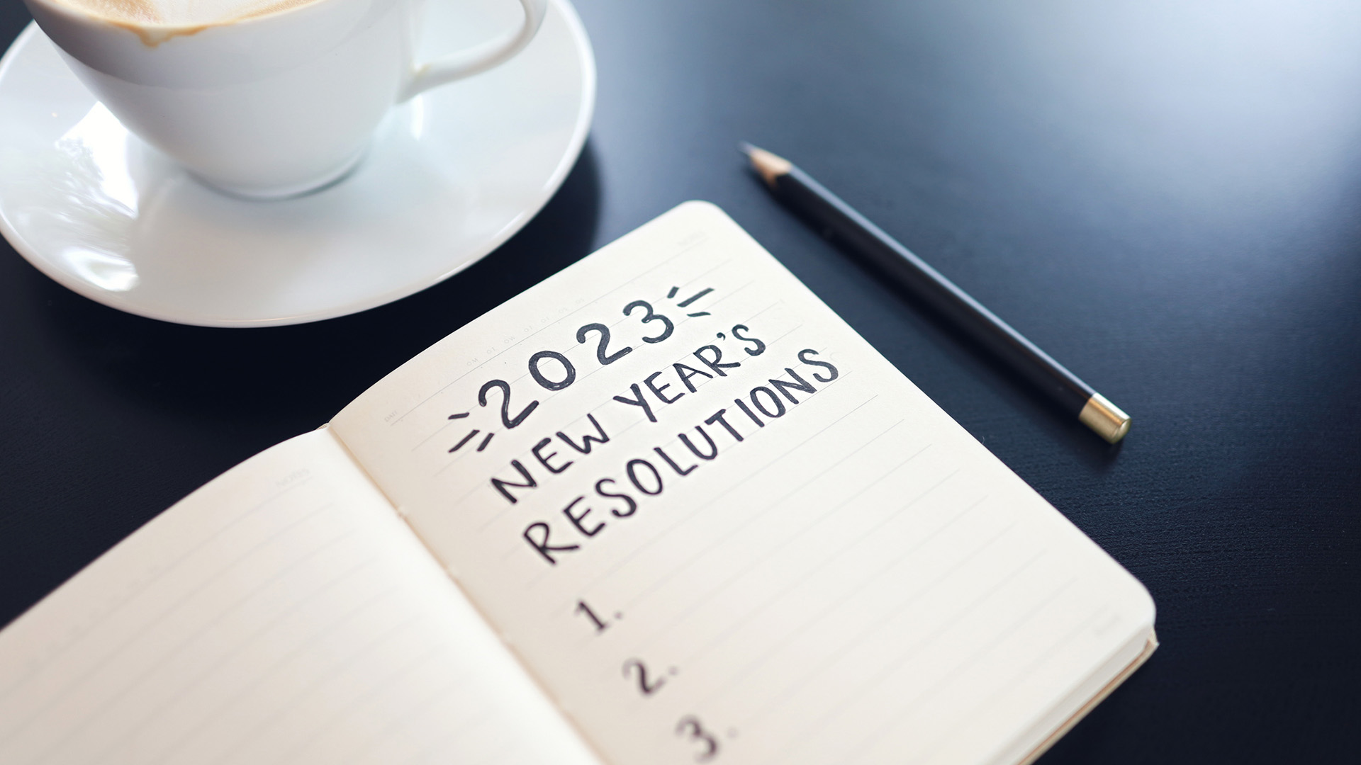 2023 New Year's Resolution Text on Note Pad