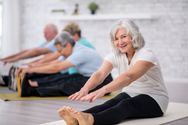 Seniors taking a yoga class